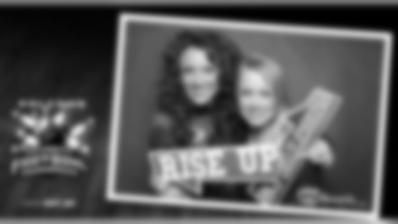 Atlanta Falcons Cheerleaders Kiley B. and Ashley G. have fun at the OMG Photo Booth