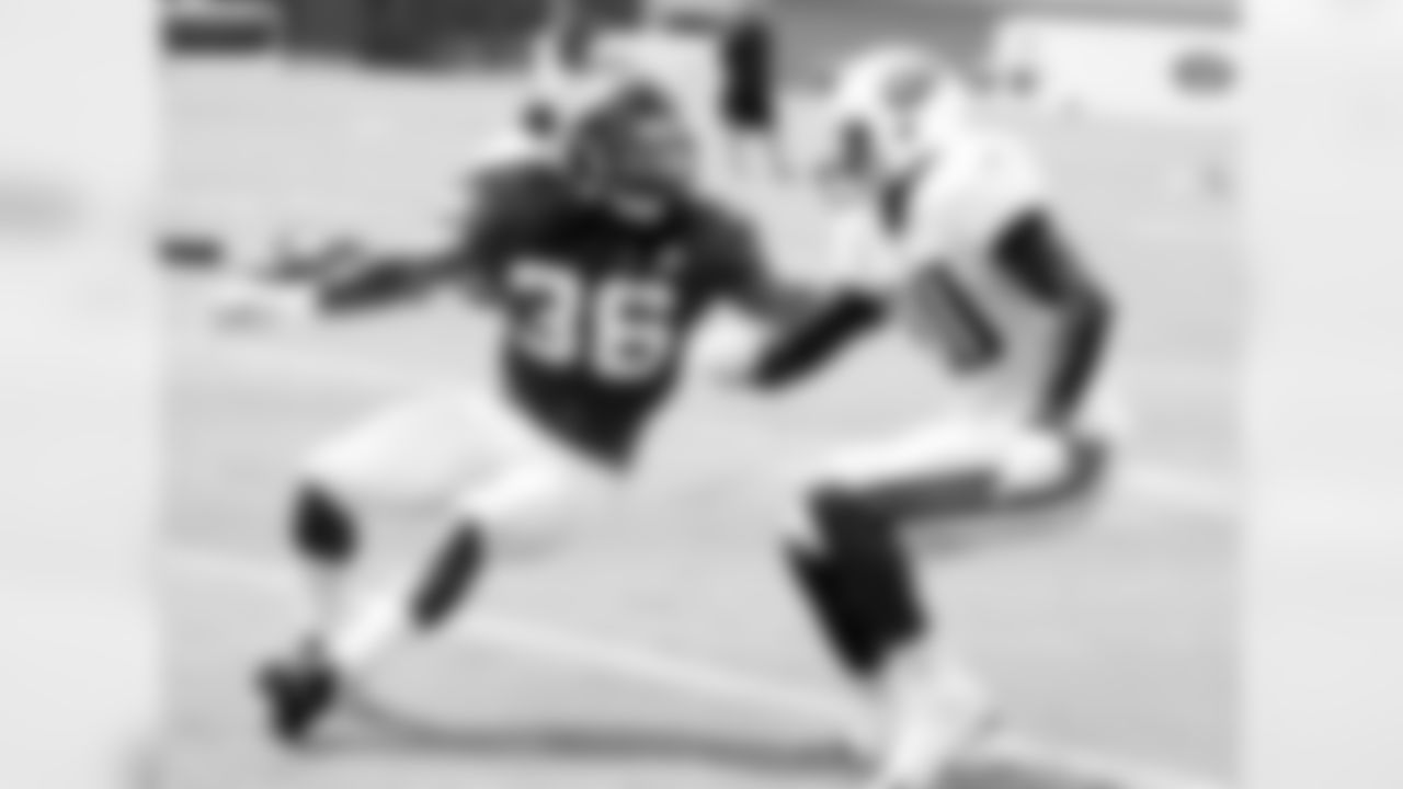 S Kemal Ishmael works to keep Titans WR Derek Hagan from the ball