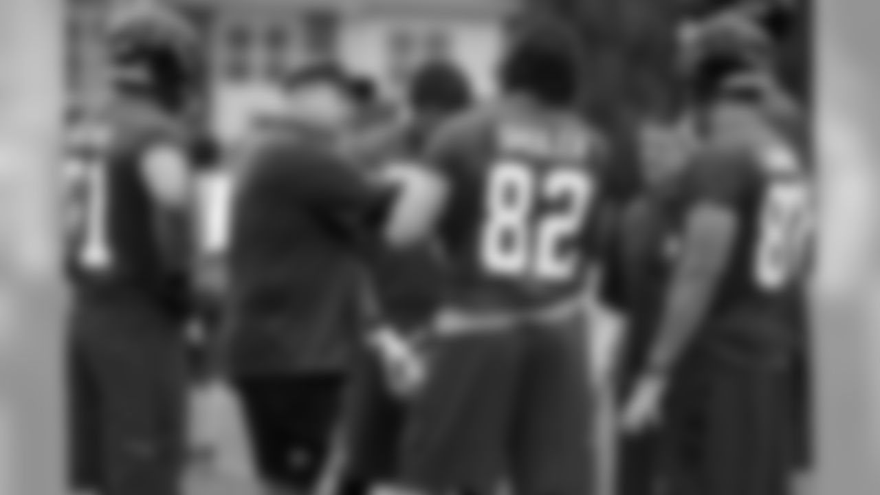Wade Harman works with the tight ends
