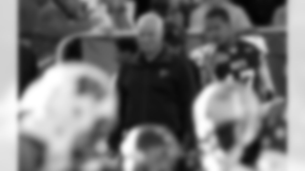 North coach Mike Smith watches the game during the first half of the Senior Bowl