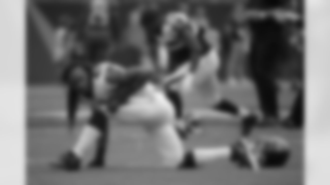 S Dezmen Southward stretching on the field before the game
