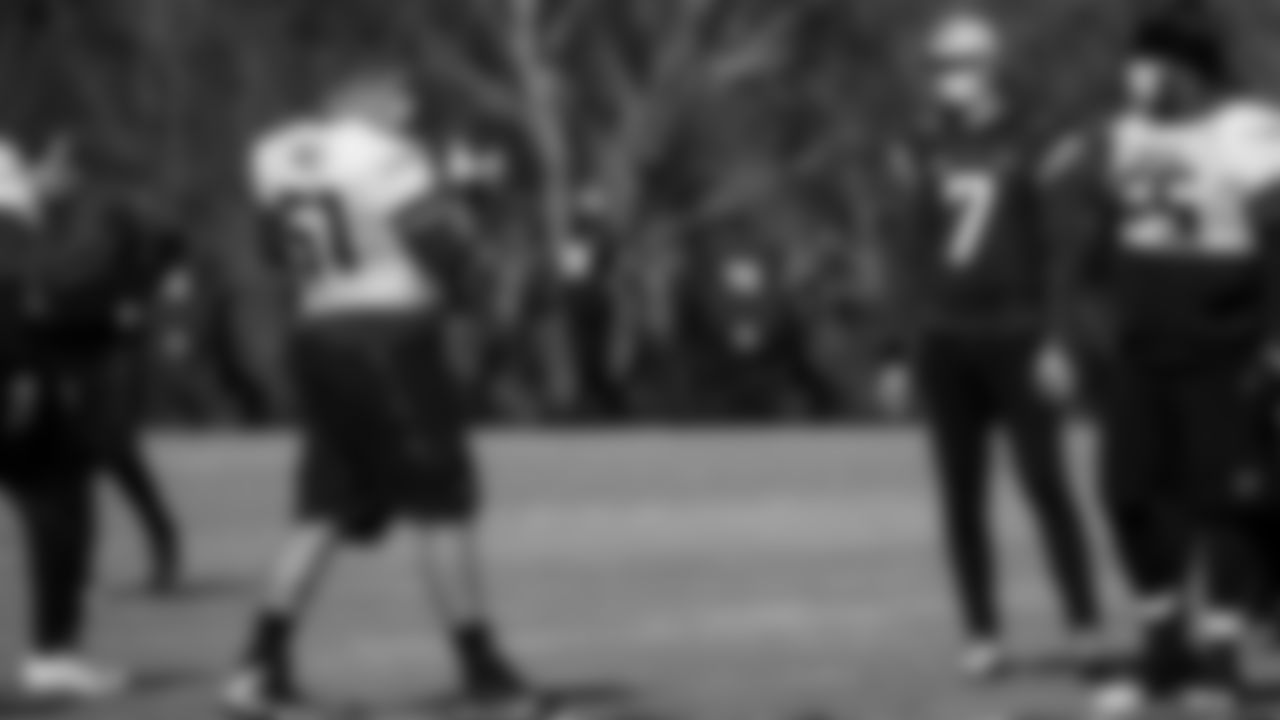 Atlanta Falcons quarterback Matt Ryan #2 wears the former University of Virginia jersey of quarterback Matt Schaub #8 after UVA beat Boston College during practice at IBM Performance Field.