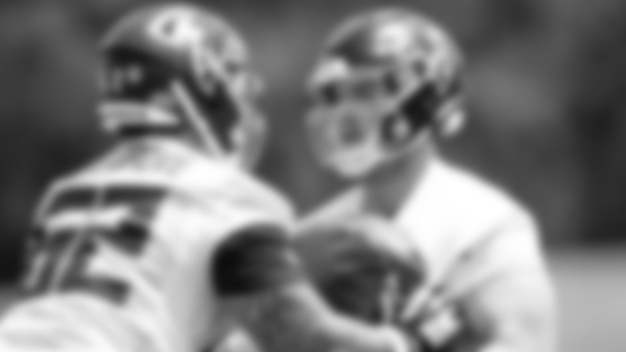 Atlanta Falcons offensive lineman Drew Dalman #67 works with offensive lineman Bryce Hargrove #62 during the first practice of Atlanta Falcons rookie minicamp on May 14, 2021.