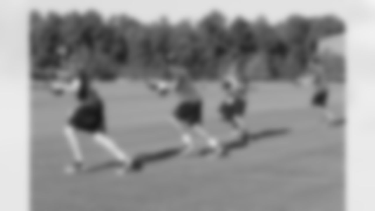 The quarterbacks warm up // 2011 Russell Athletic Training Camp - Day 10 // August 10, 2011 // Flowery Branch, Ga. —