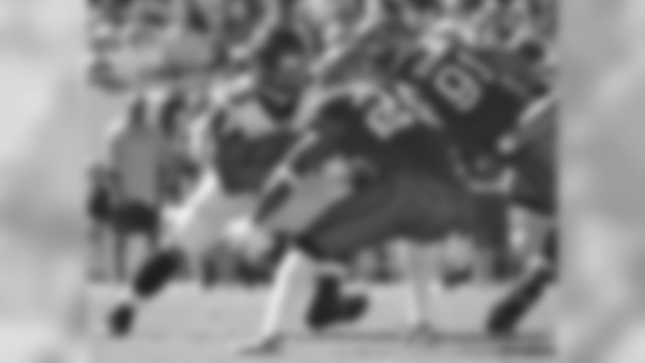 RB Michael Turner takes on two Tampa Bay defenders