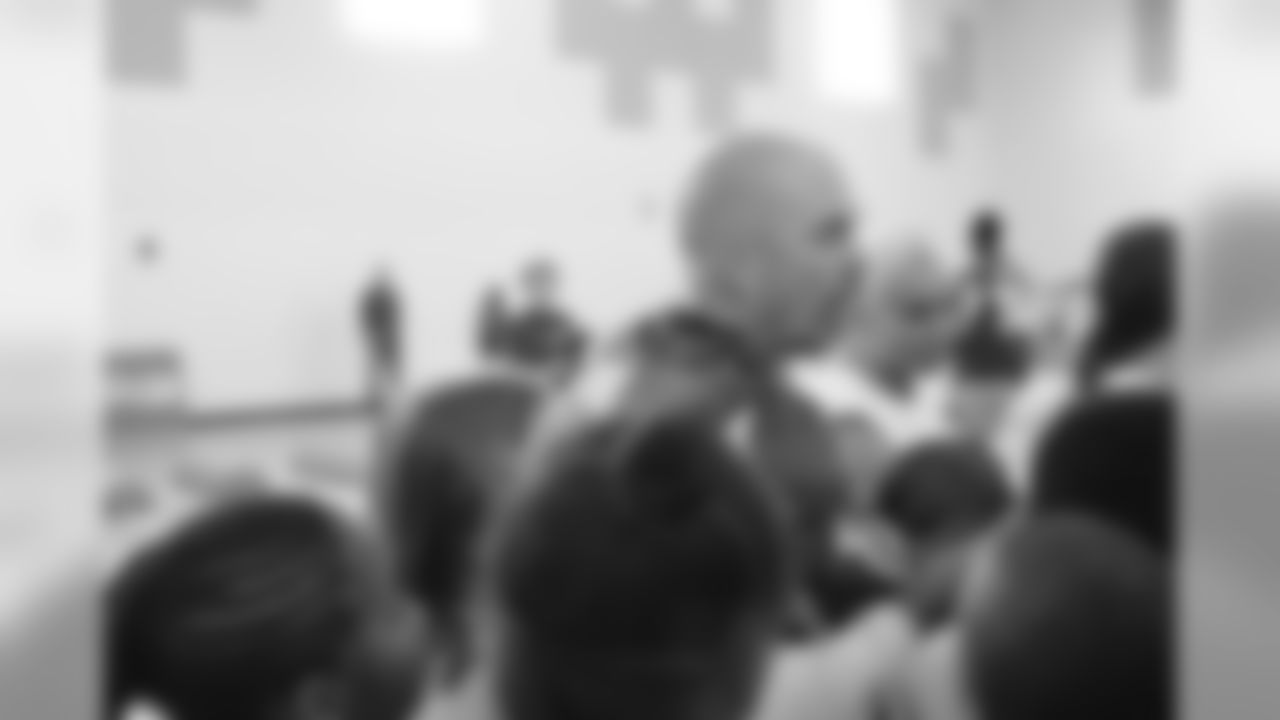 K Matt Bryant breaks down a group of kids