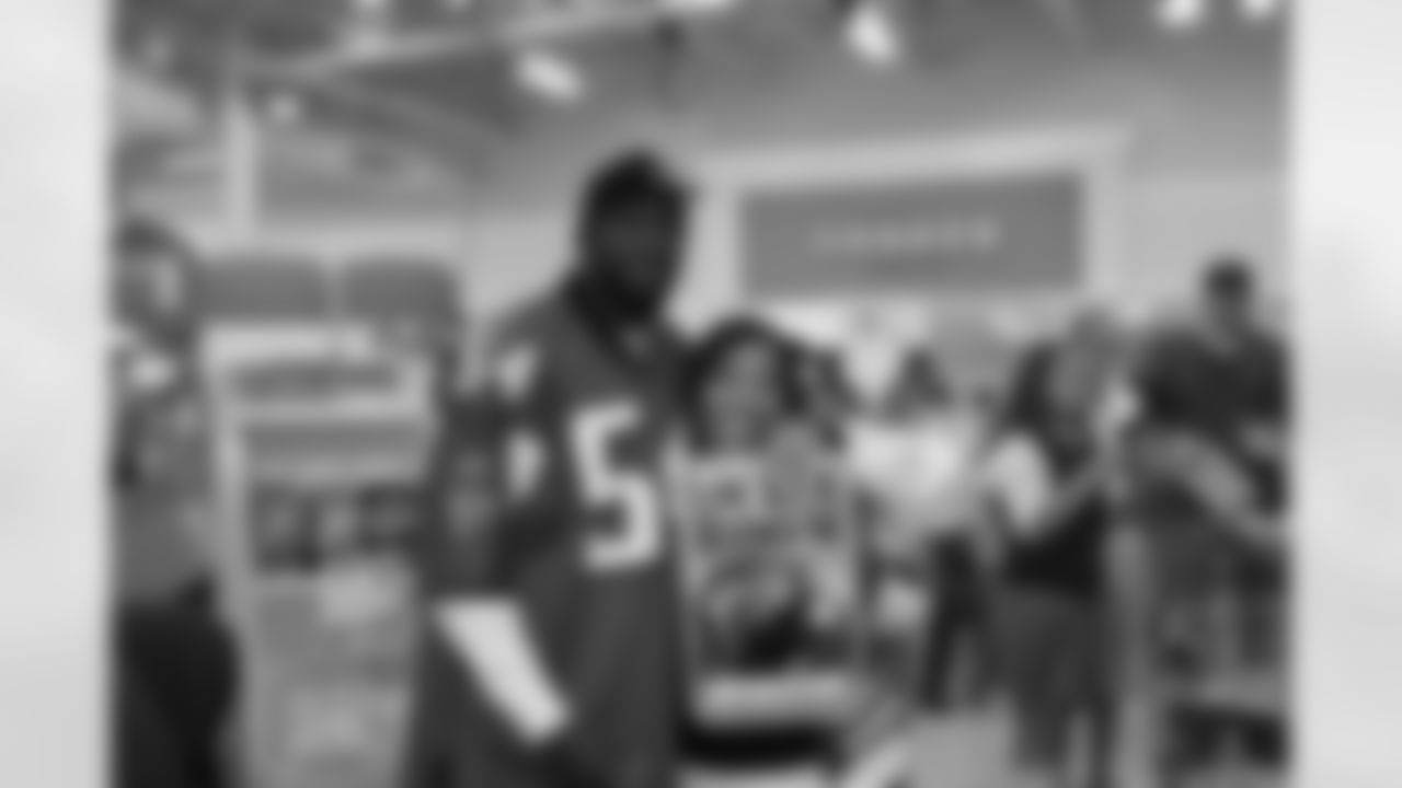 Stephen Nicholas excites the Publix shoppers in Locust Grove, Ga. with the Atlanta Falcons Tailgate Team // Atlanta Falcons Tailgate Team 2011 //Nov. 1, 2011 // Locust Grove, Ga. -