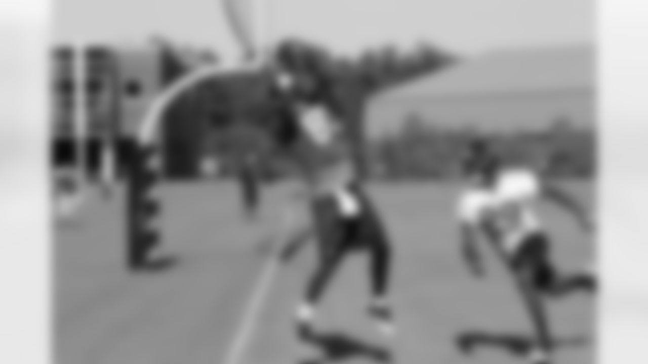 WR Harry Douglas makes a catch while CB Darrin Walls defends // 2011 Russell Athletic Training Camp - Day 10 // August 10, 2011 // Flowery Branch, Ga. —