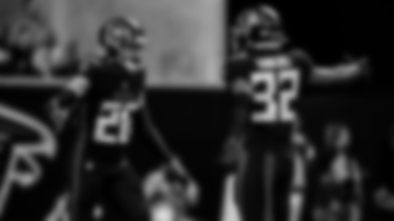 Atlanta Falcons cornerback Isaiah Oliver #26 and safety Jaylinn Hawkins #32 react after a stop during the first quarter against the Tampa Bay Buccaneers at Mercedes-Benz Stadium in Atlanta, Georgia on Sunday, January 8, 2023. (Photo by Brandon Magnus/Atlanta Falcons)