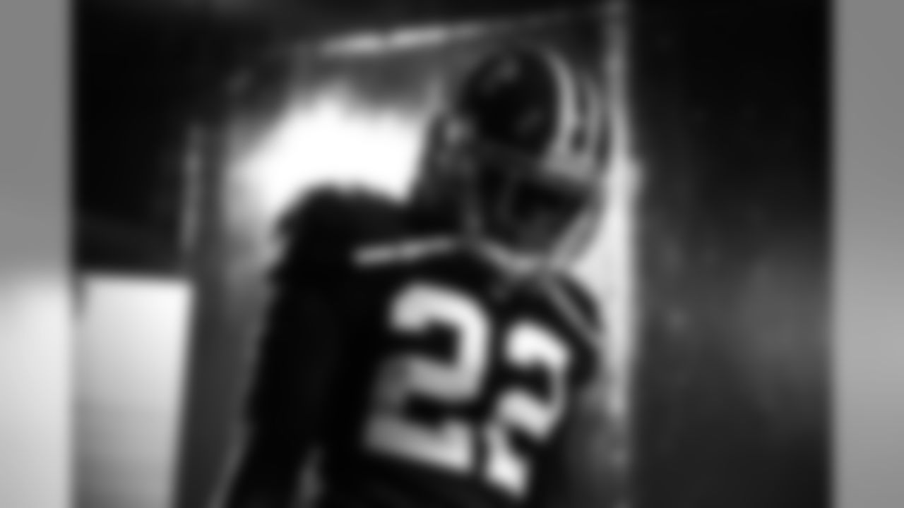 CB Asante Samuel exits the locker room and heads to the field.