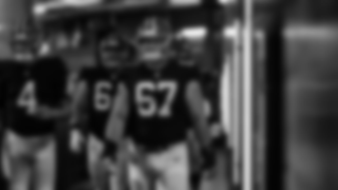 Atlanta Falcons offensive lineman Drew Dalman #67, Atlanta Falcons offensive lineman Ryan Neuzil #64 and Atlanta Falcons quarterback Desmond Ridder #4 walk out of the locker room before warmups before the game against the Pittsburgh Steelers at Mercedes-Benz Stadium in Atlanta, Georgia on Sunday, December 4, 2022. (Photo by Mitchell Martin/Atlanta Falcons)