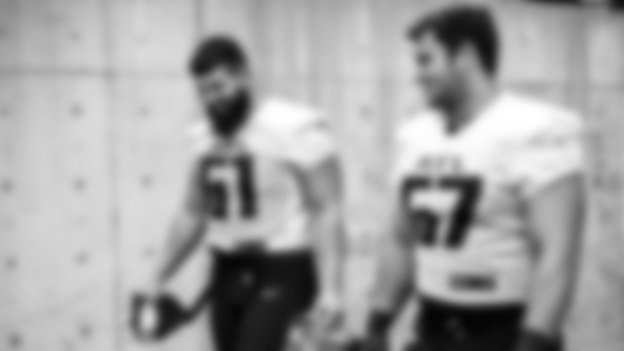 Atlanta Falcons offensive lineman Matt Hennessy #61 and offensive lineman Drew Dalman #67 walk out to the field during practice at the University of Washington in Seattle, WA, on Thursday, September 22, 2022. (Photo by Brandon Magnus/Atlanta Falcons)