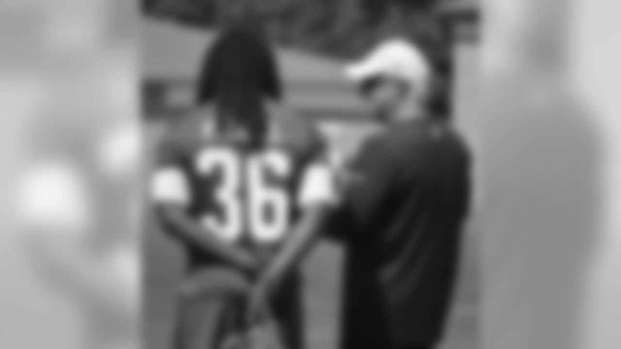 S Kemal Ishmael and head coach Mike Smith