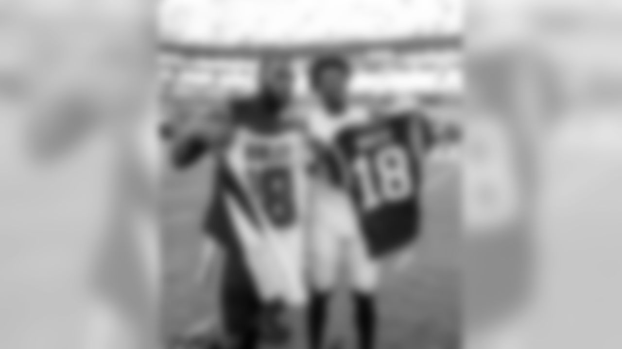 Atlanta Falcons wide receiver Calvin Ridley #18 swaps jerseys with Carolina Panthers wide receiver DeAndrew White #18 after the game at Bank of America Stadium in Charlotte, NC, on Sunday November 17, 2019. (Photo by Lynn Bass/Atlanta Falcons)