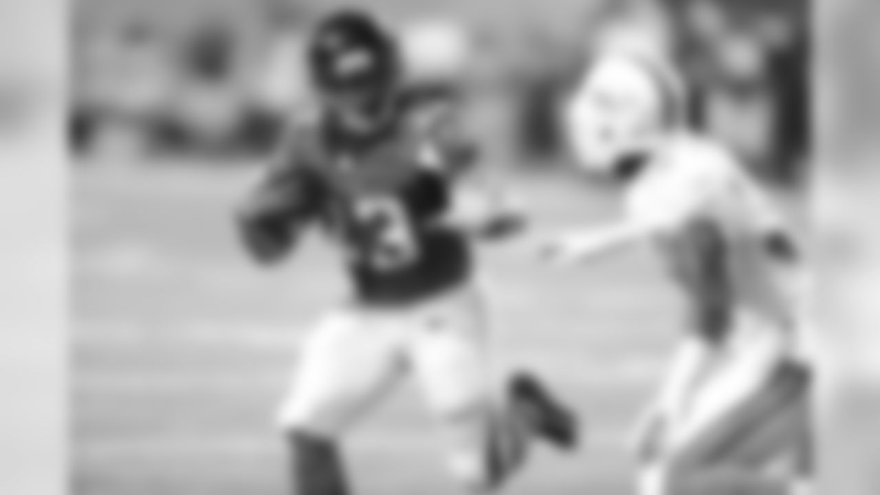 RB Devonta Freeman running the ball.