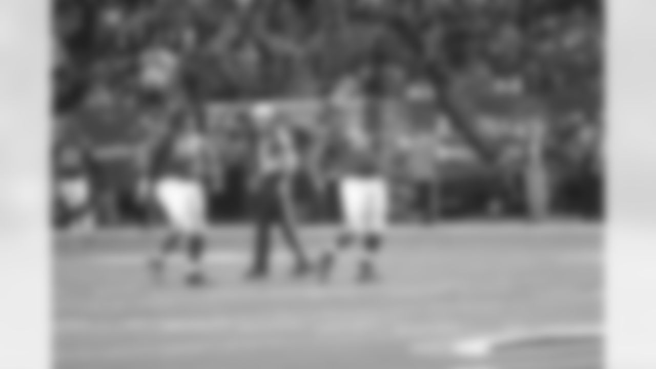 DT Corey Peters celebrates his sack on Jets QB Geno Smith