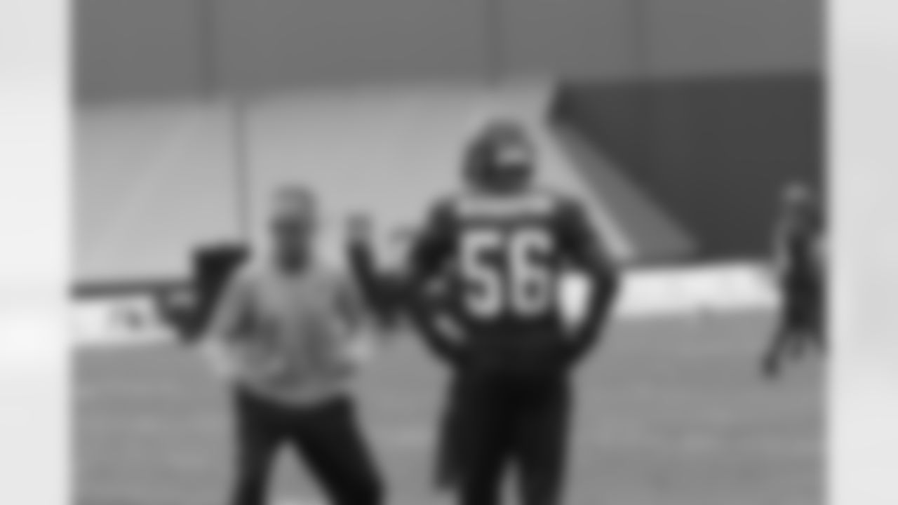 Defensive coordinator Mike Nolan and LB Sean Weatherspoon