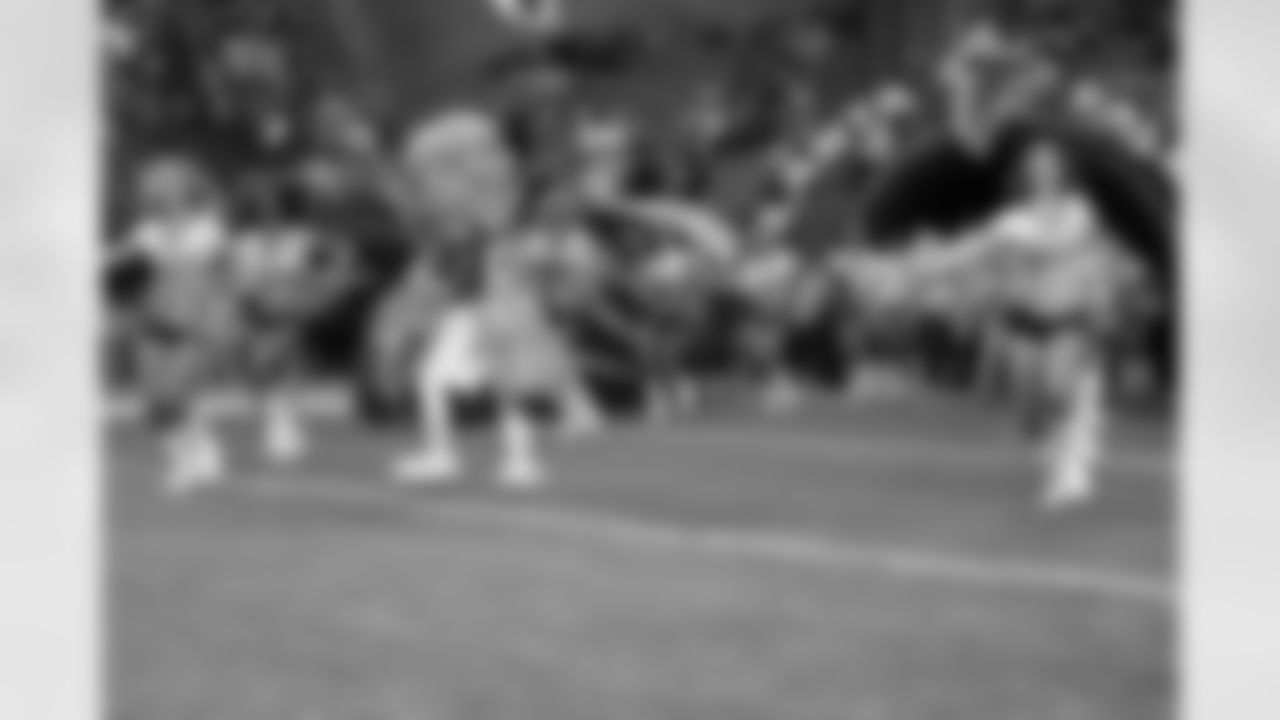The Falcons Cheerleaders lead the team onto the field // Falcons vs. Dolphins - Cheerleaders // August 12, 2011 // Atlanta -