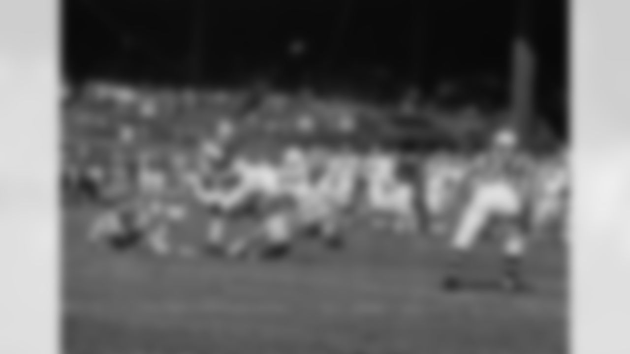 Flanker John Henderson (97) of the Detroit Lions is tripped up after taking a long pass from Karl Sweetan. Atlanta Falconsí defensive back Lee Calland comes flying in to make certain Henderson stays down. At left is Lionsí Bill Malinchak. Detroit won 24-3 on Oct. 22, 1967 in Detroit. (AP Photo/PS)