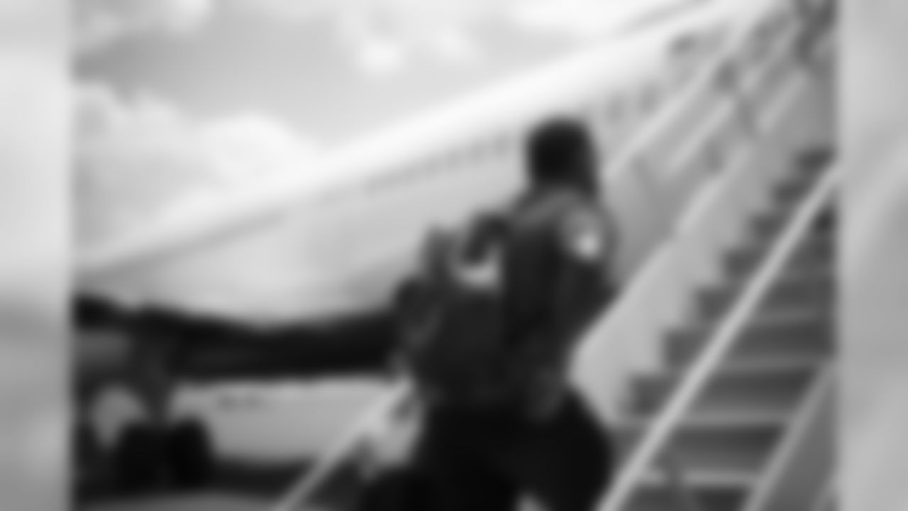 Atlanta Falcons defensive tackle Grady Jarrett #97 boarding the team plane at Hartsfield-Jackson International Airport in Atlanta, Florida, on Wednesday August 7, 2019. (Photo by Austin Hittel/Atlanta Falcons)