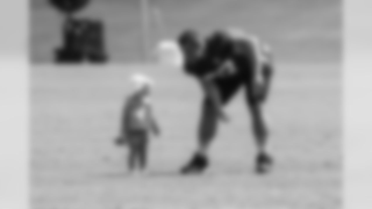 G Andy Levitre with his daughter at Training Camp