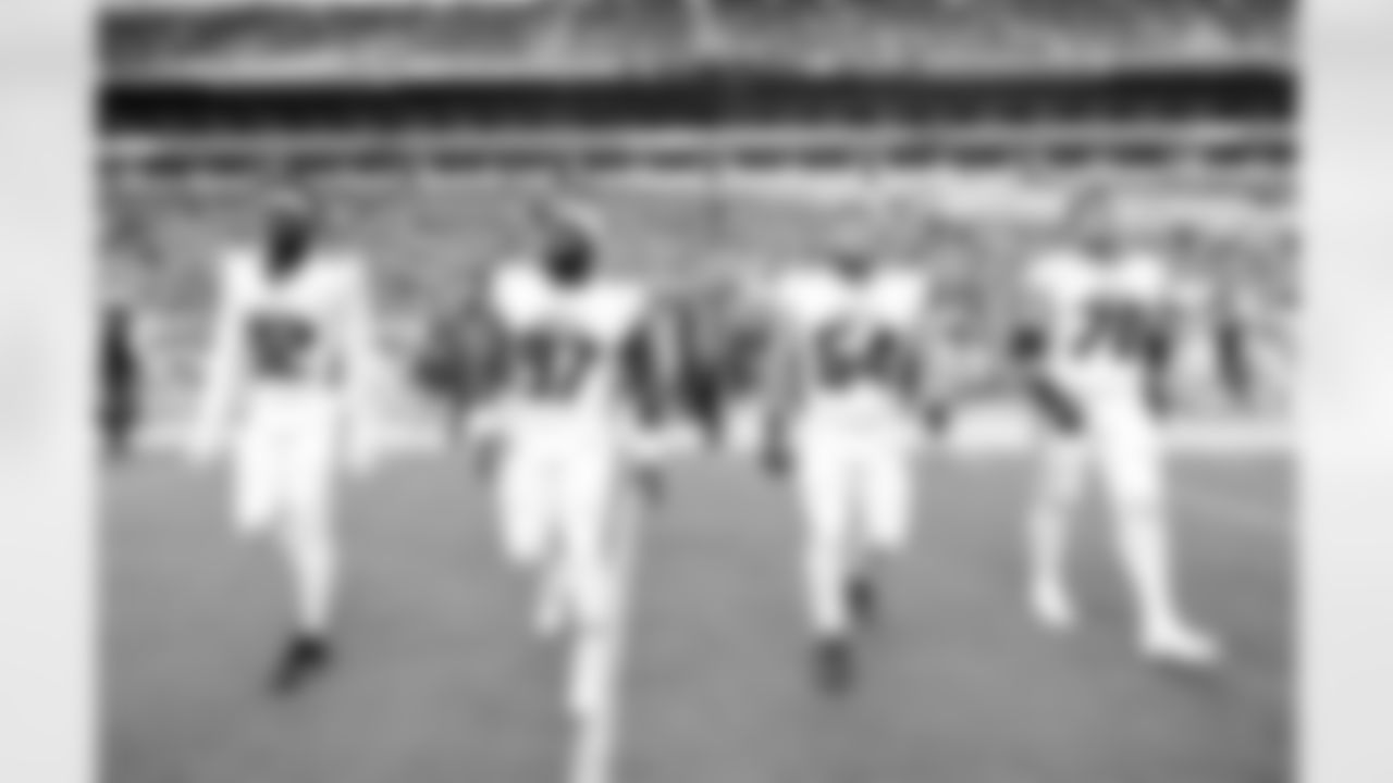 Captains walk to midfield for the toss prior to the Preseason Game against the Miami Dolphins at Hard Rock Stadium in Miami Gardens, Florida on Friday, August 11, 2023. (Photo by Jay Bendlin/Atlanta Falcons)