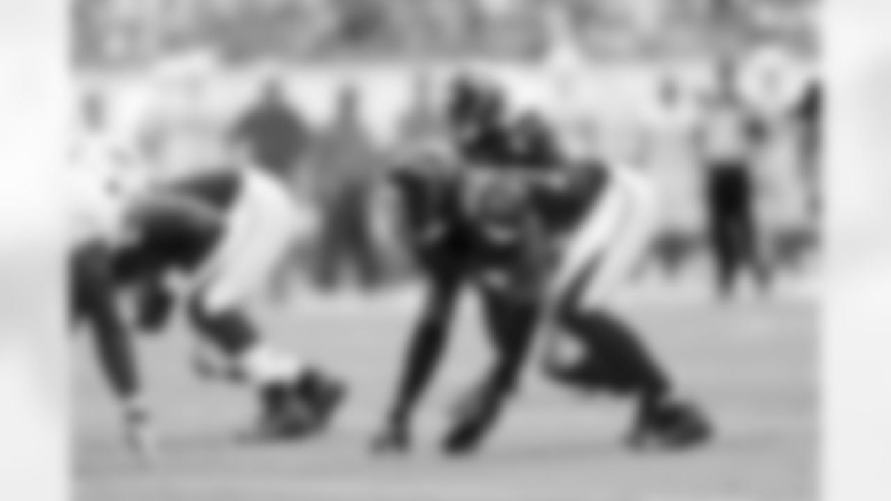 DE Jonathan Massquoi lined up against the Dolphins