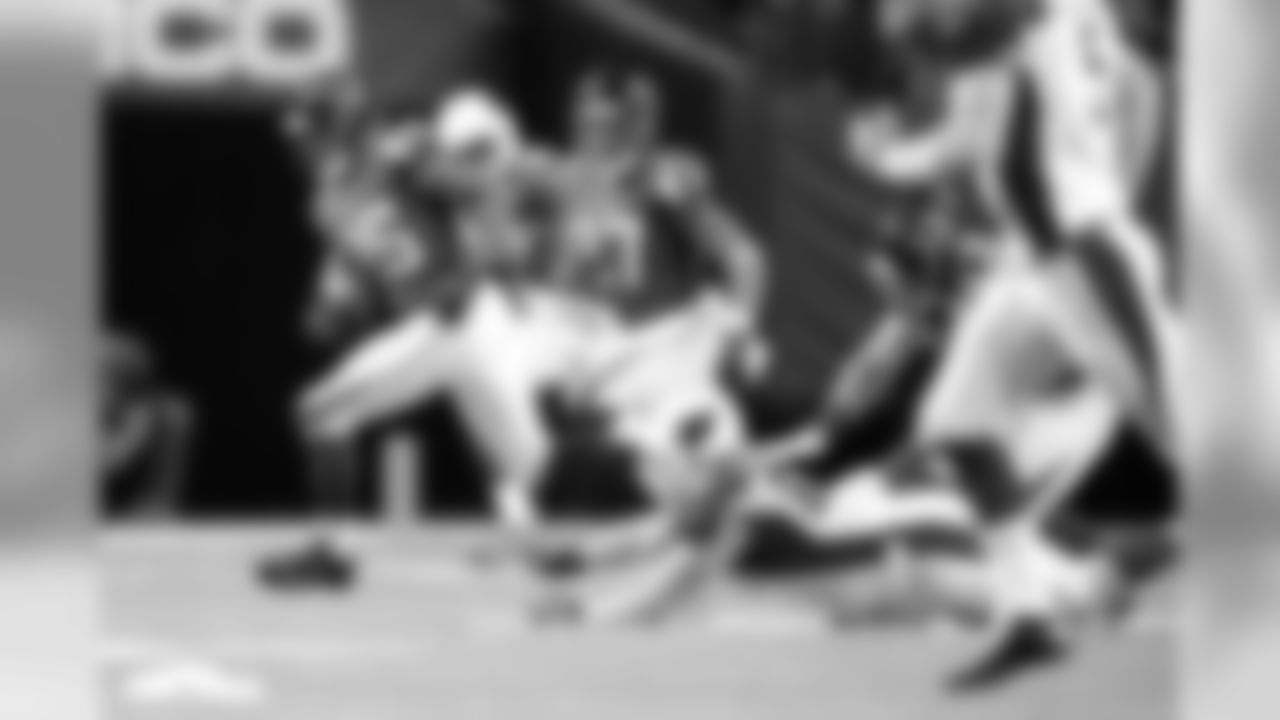 CB Josh Wilson returns an interception during the second half of play.