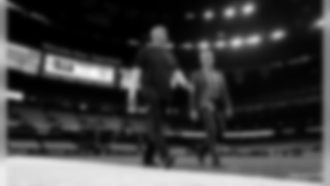 Atlanta Falcons general manager Thomas Dimitroff (right) walks with Atlanta Falcons head coach Dan Quinn (left) at the Mercedes-Benz Superdome before the game against the New Orleans Saints in New Orleans, LA, on Sunday November 10, 2019. (Photo by Mark Brown/Atlanta Falcons)