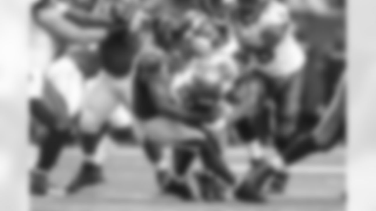 DE Osi Umenyiora brings down Tampa Bay running back Doug Martin
