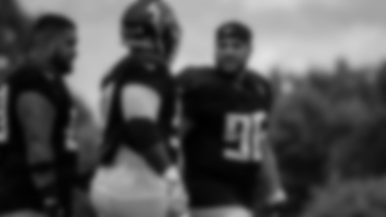 Atlanta Falcons defensive tackle Tyeler Davison #96 taks with defensive tackle Grady Jarrett #97 during the AT&T Atlanta Falcons Training Camp at Atlanta Falcons Headquarters in Flowery Branch, Georgia, on Monday August 16, 2021. (Photo by )