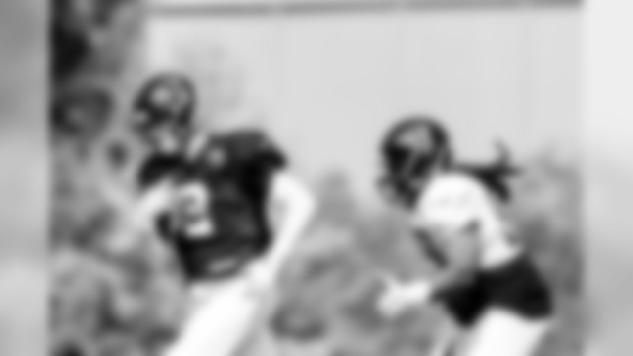 July 27, 2019 - DE Adrian Clayborn runs toward QB Matt Ryan on the fifth day of practice. (Photo by Kara Durrette/Atlanta Falcons)
