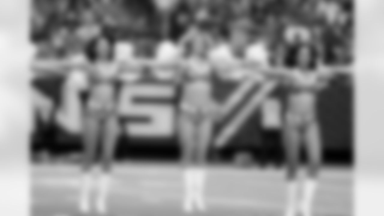 The Atlanta Falcons Cheerleaders perform before the Falcons' Salute to Service game vs. the Cardinals