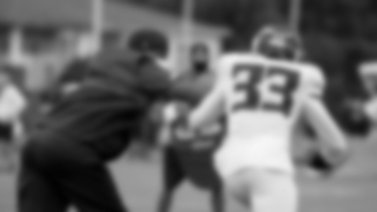 Defensive coordinator Raheem Morris works with Atlanta Falcons defensive back Blidi Wreh-Wilson #33 during practice at IBM Performance Field. (Photo by Kara Durrette/Atlanta Falcons)