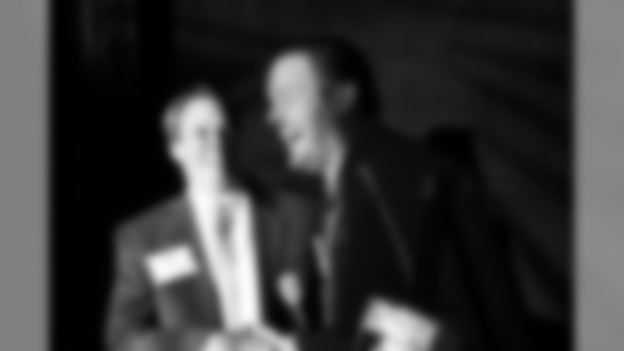 G/C Peter Konz shares a laugh with UnitedHealthcare CEO Rick Elliott // Rookie Club Dinner - 2012 // May 29, 2012 // Atlanta -