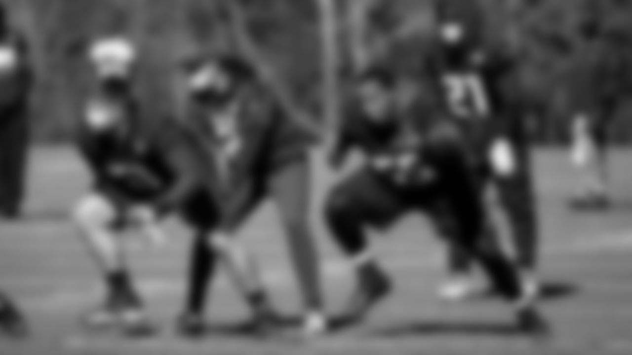 Atlanta Falcons quarterback Matt Ryan #2 warms up with center Alex Mack #51 and offensive guard Justin McCray #65 during practice at IBM Performance Field.