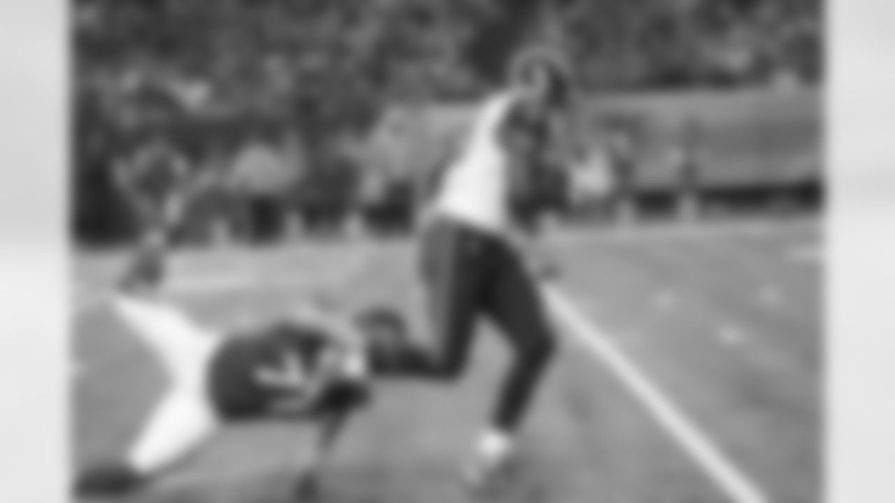 DE Kroy Biermann commits to make a tackle