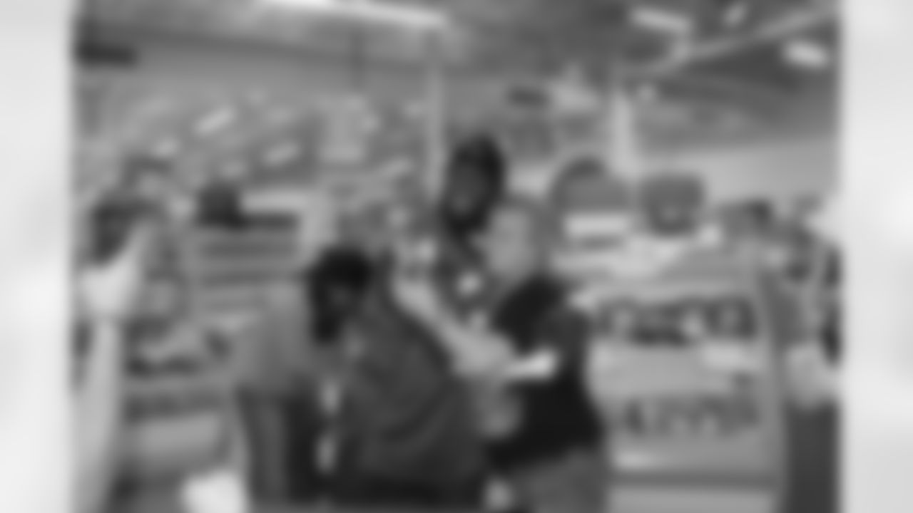 Stephen Nicholas excites the Publix shoppers in Locust Grove, Ga. with the Atlanta Falcons Tailgate Team // Atlanta Falcons Tailgate Team 2011 //Nov. 1, 2011 // Locust Grove, Ga. -