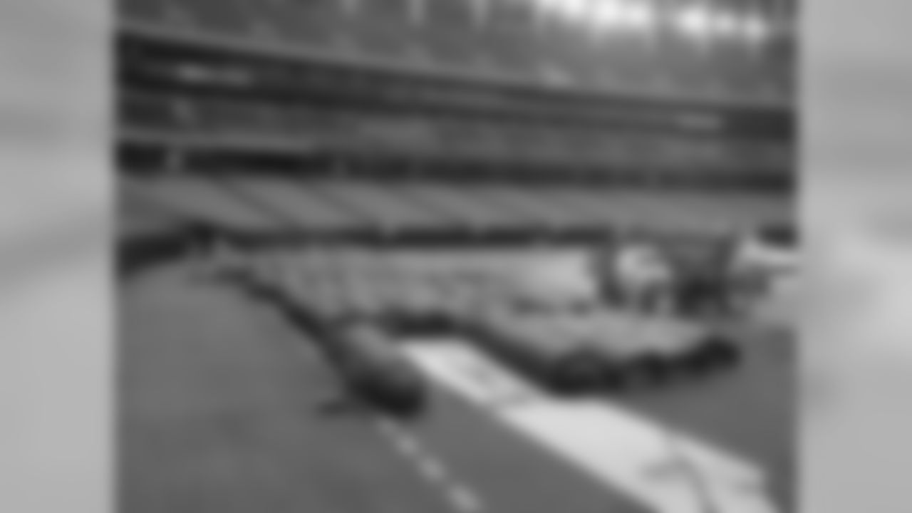 The turf comes in big rolls before being pulled out on the Georgia Dome floor // July 2011 // Atlanta -