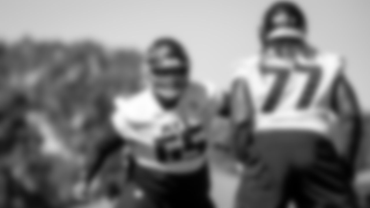 Atlanta Falcons guard Justin McCray #65 works with guard James Carpenter #77 during practice at IBM Performance Field. (Photo by Kara Durrette/Atlanta Falcons)