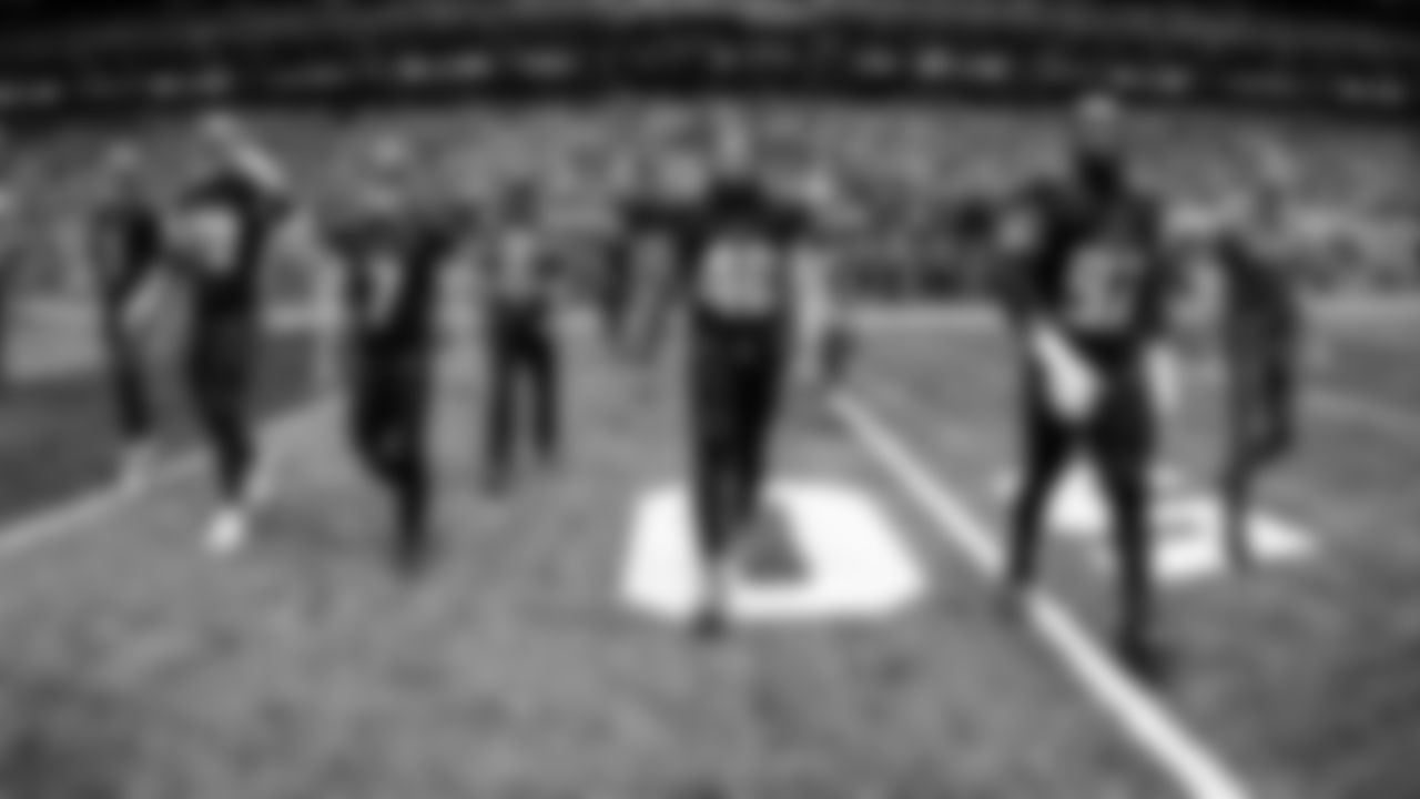 Captains walk to midfield for the coin toss prior to the game against the Los Angeles Chargers at Mercedes-Benz Stadium in Atlanta, Georgia on Sunday, November 6, 2022. (Photo by Shanna Lockwood/Atlanta Falcons)