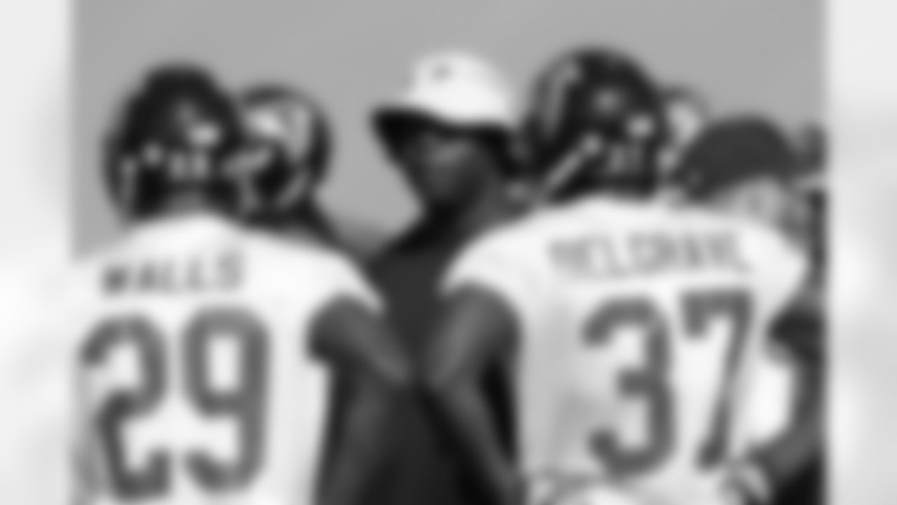 Secondary coach Tim Lewsi talks to DBs Darrin Walls and Kirk Belgrave // 2011 Russell Athletic Training Camp - Day 11 // August 11, 2011 // Flowery Branch, Ga. —