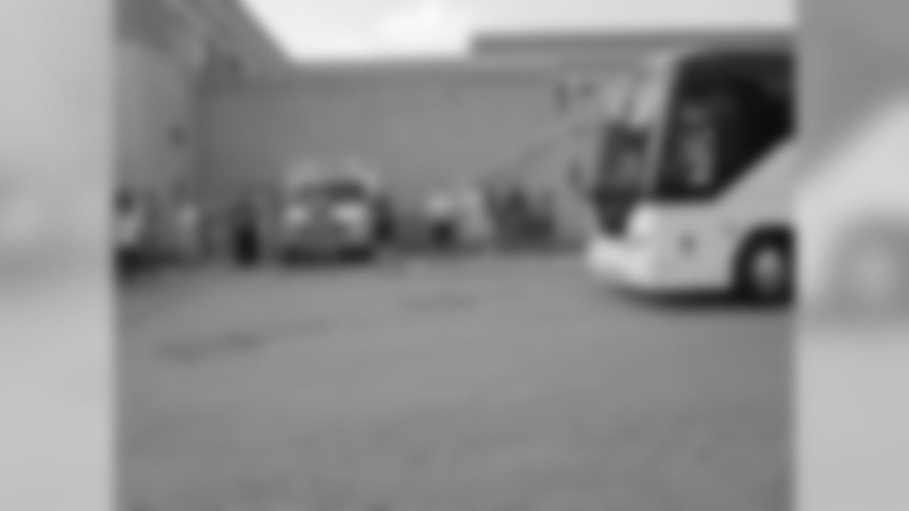 The first of four buses arrive // 2011 Friday Night Lights // August 5, 2011 // Norcross, Ga. —