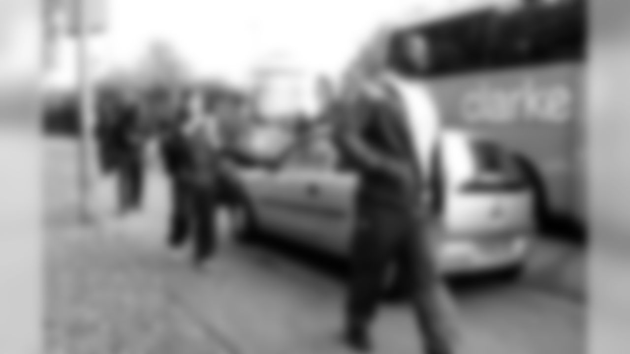 C James Stone walks away from the bus in London