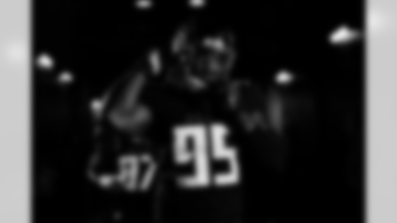 Atlanta Falcons defensive tackle Ta'Quon Graham #95 walks out before the game against the New Orleans Saints at Mercedes-Benz Stadium in Atlanta, Georgia on Sunday, January 9, 2022. (Photo by Brandon Magnus/Atlanta Falcons)