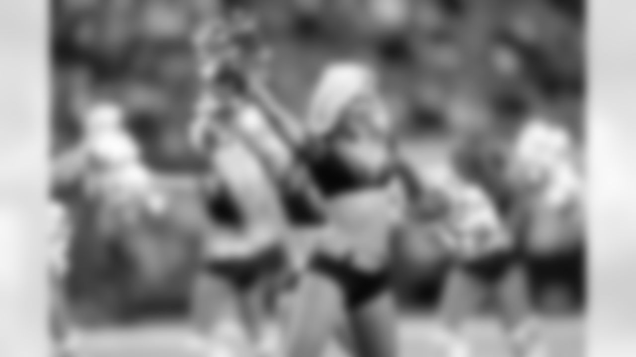 Rookie cheerleader Kenley M. cheers during Sunday's game