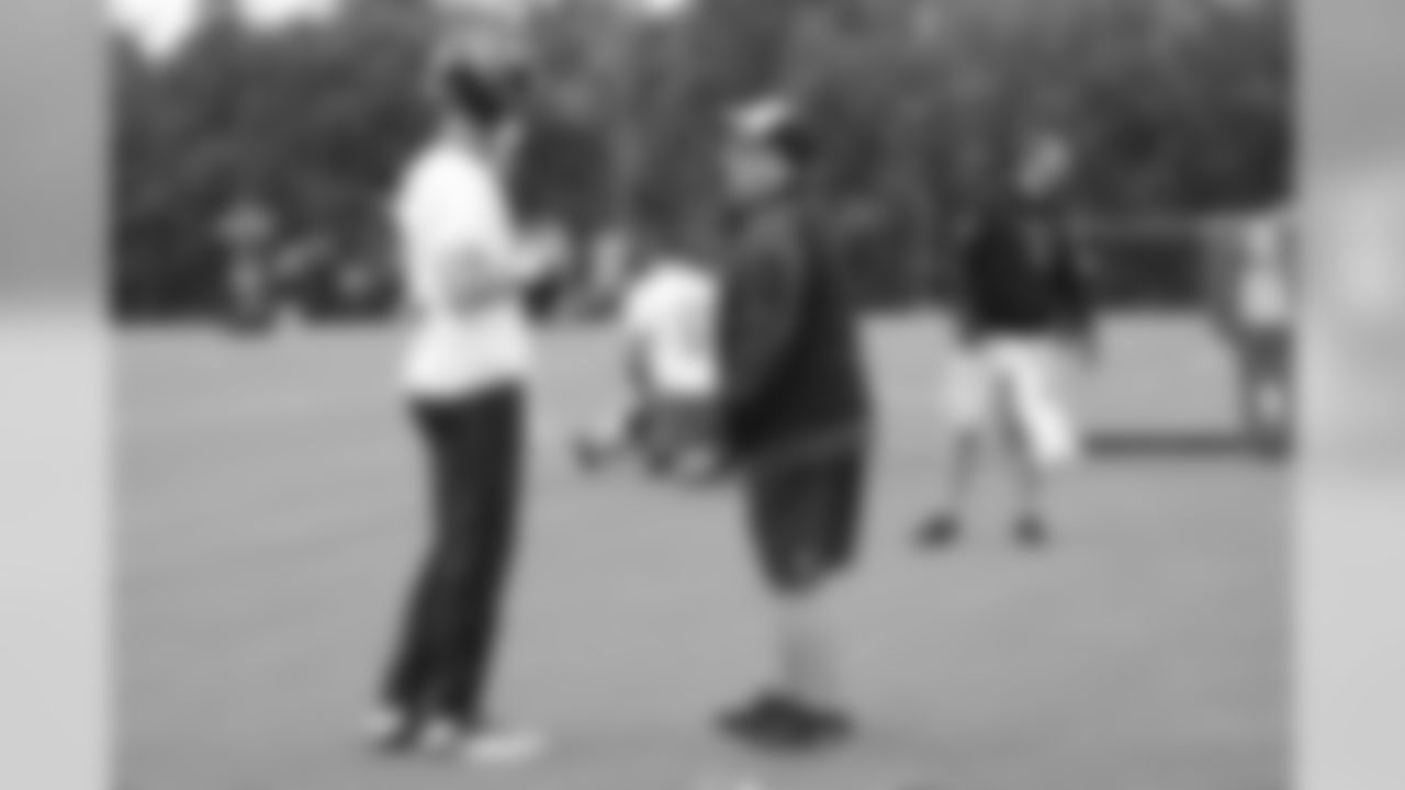 QB Matt Ryan talks to tight ends coach, Chris Scelfo