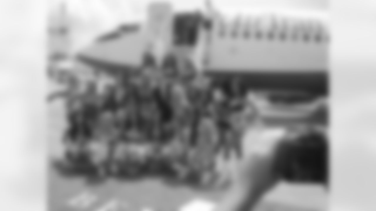 The cheerleaders participate in a short ceremony with AirTran execs to celebrate the inaugural AirTran flight to Bermuda // Atlanta Falcons Cheerleaders Swimsuit Calendar Photo Shoot - Day 1 // 5/26/11 // Bermuda -