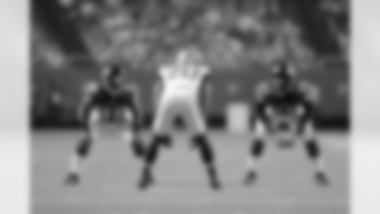 CB Terrence Johnson and S Kemal Ishmael keep their eyes on Jaguars CB Mike Harris
