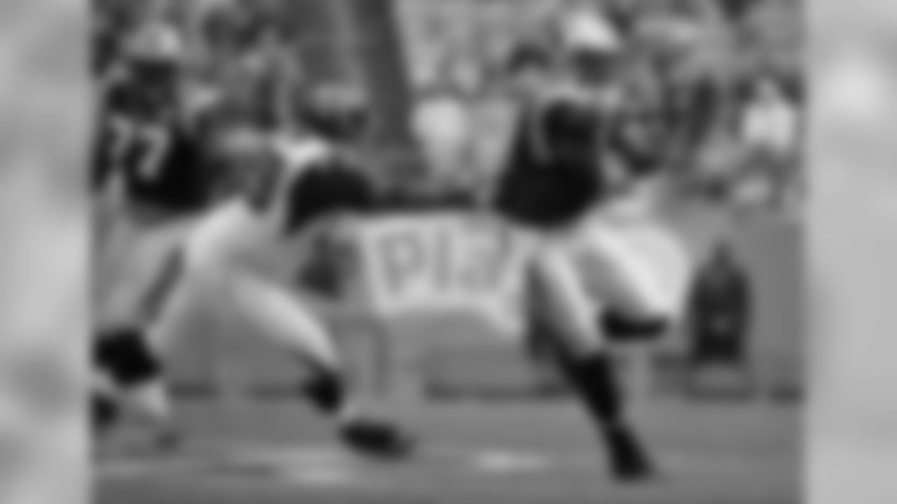 DE Vance Walker forces Carolina Panthers QB Cam Newton out of the pocket